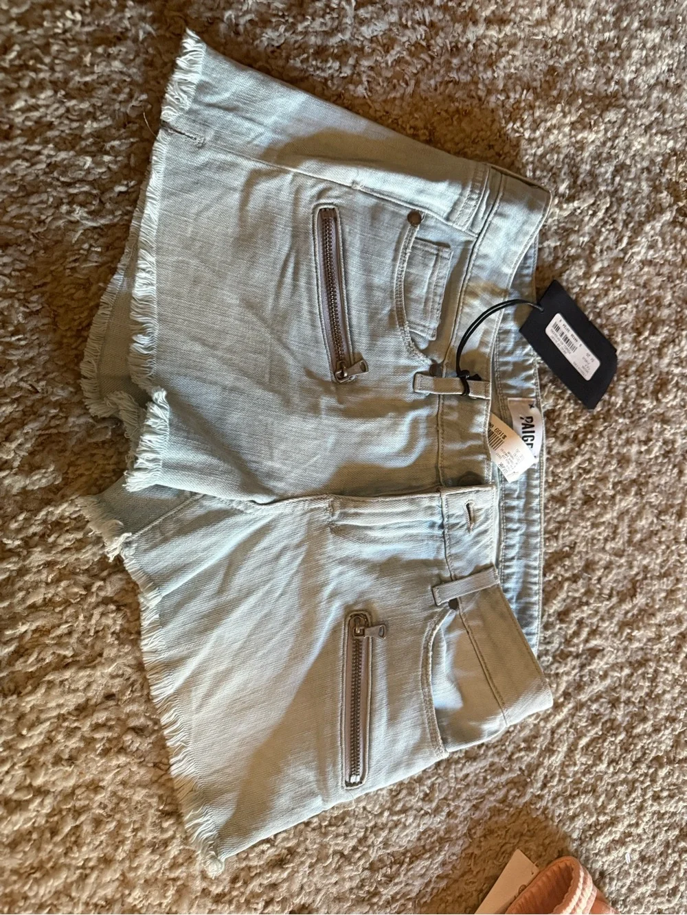 PAIGE Light denim Frayed Hem Denim Shorts with Zipper Accents